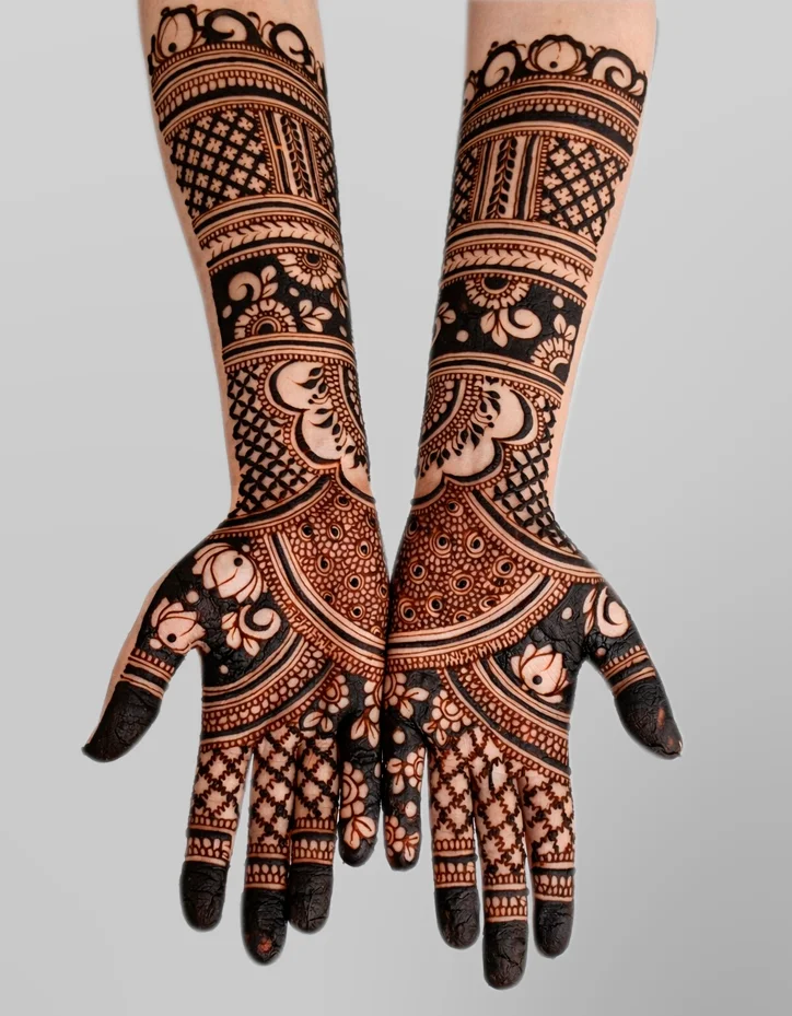 Bridal henna design on bride's hands by henna artist in Dubai